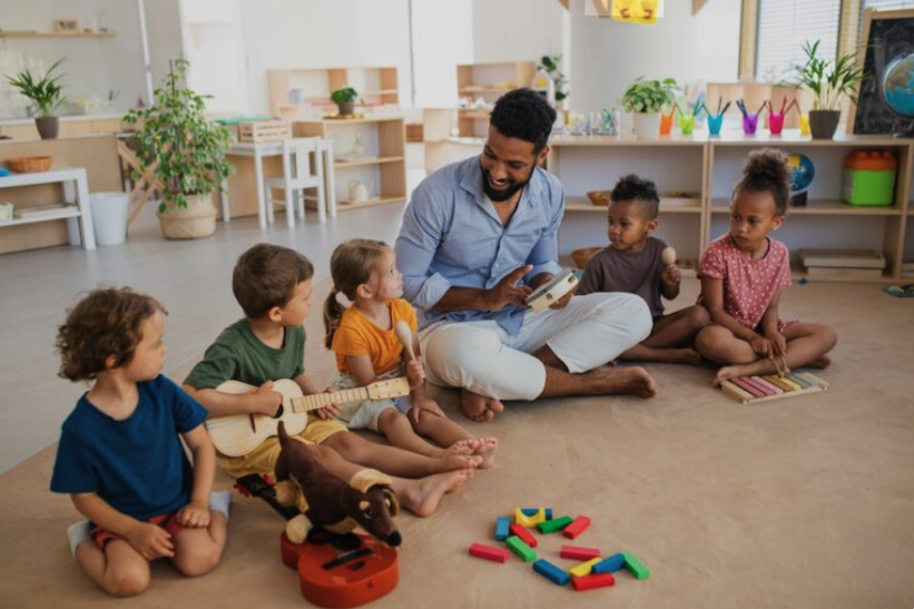 Teacher reading on floor