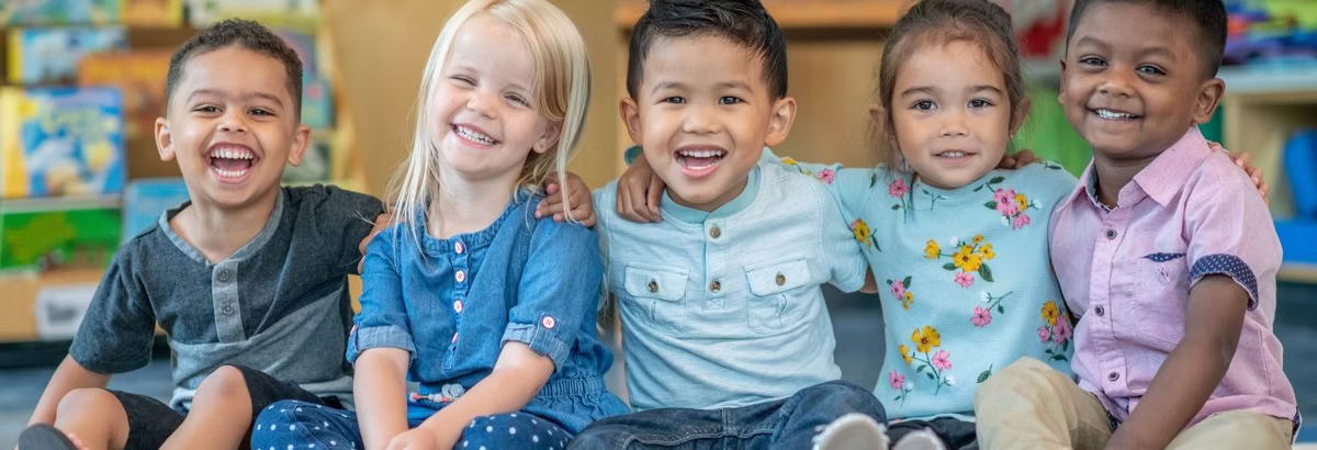 Toddlers engaged in creative play activities