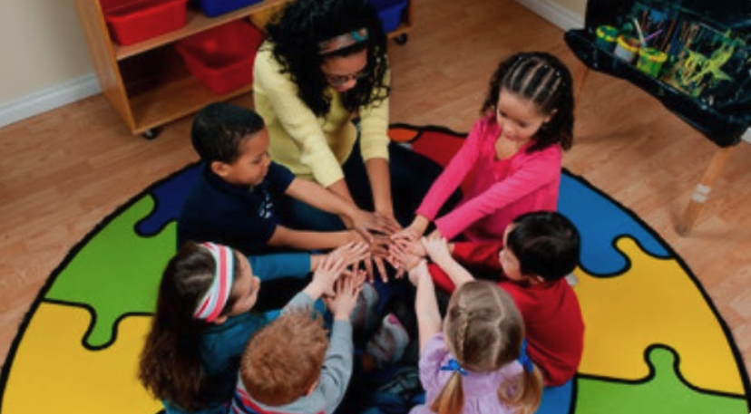 Teacher doing circle time with children